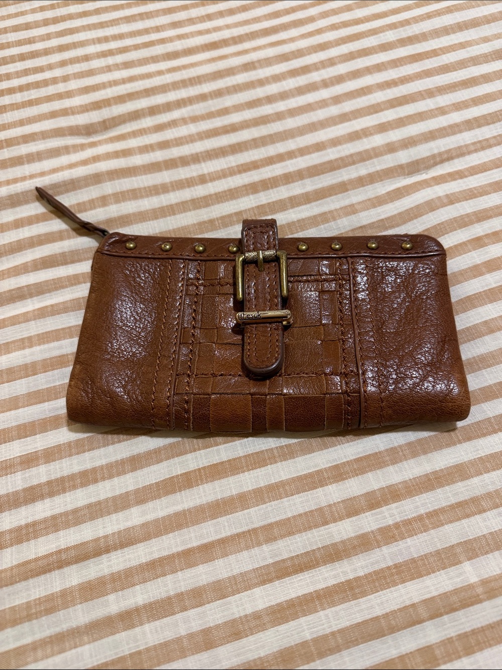 The Sak Brown Leather Zip Wallet with Buckle Accent
